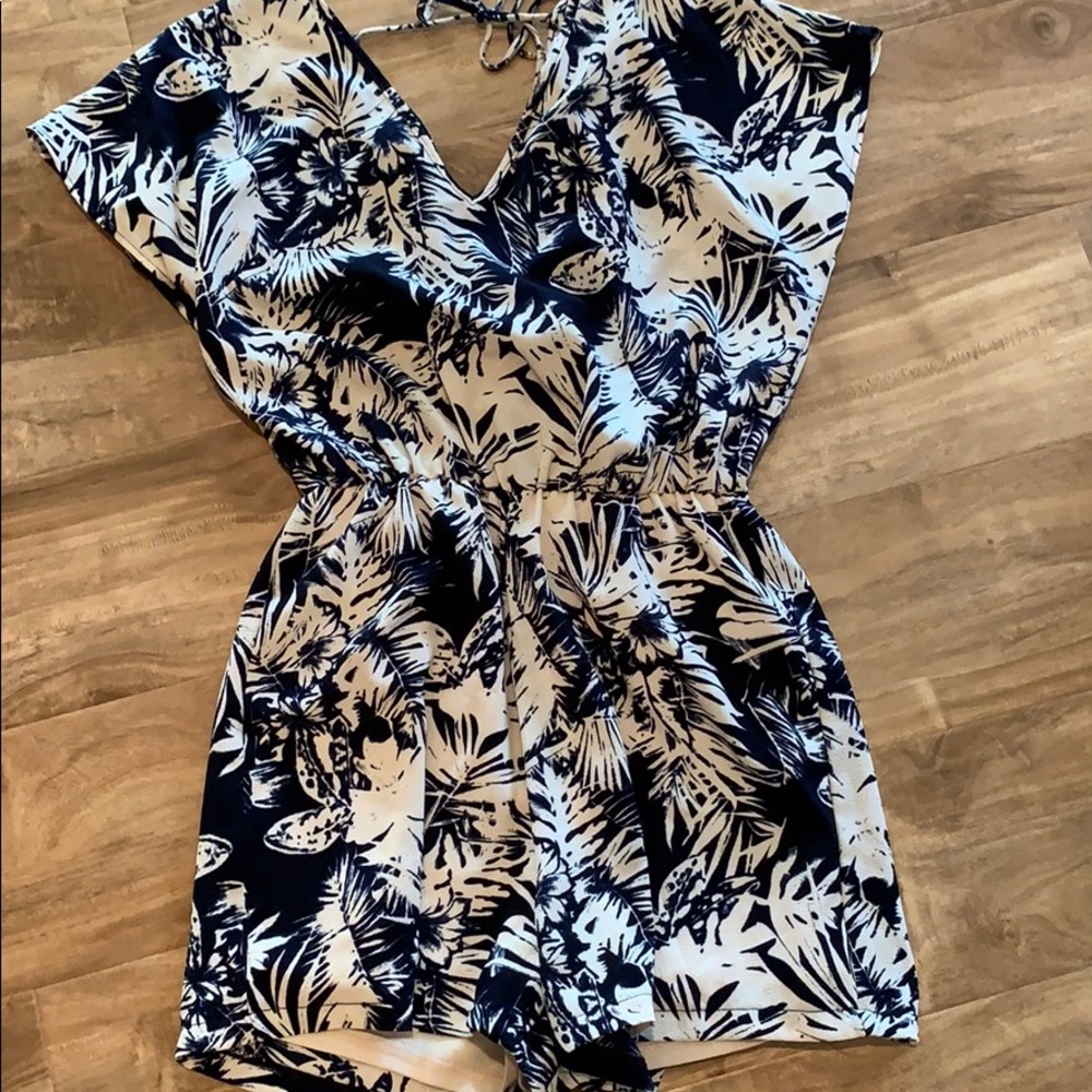 Women’s blue tropical short romper. Size M